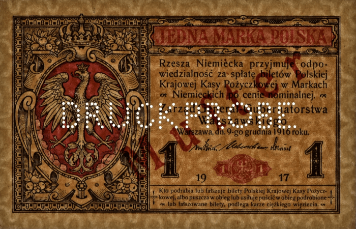 wzór banknotu 1 marki z perforacją - zdjęcie zrobione pod światło